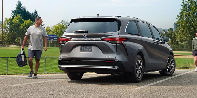 Man next to a silver 2025 Toyota Sienna