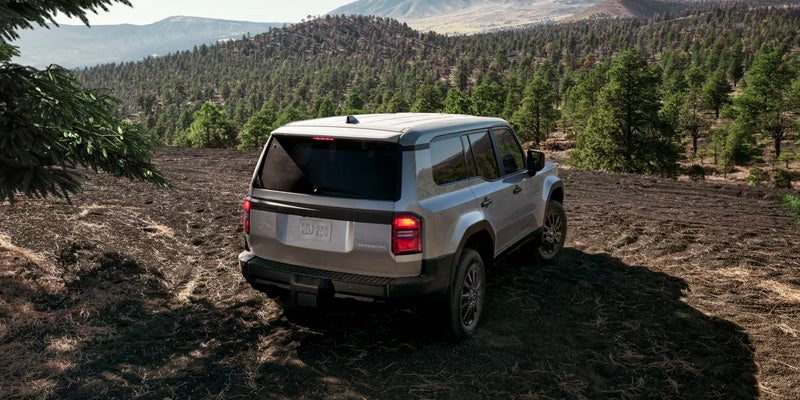 2027 Toyota Land Cruiser cabin featuring 12.3-inch touchscreen and off-road controls